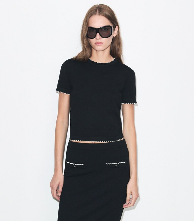 Tory Burch diseñador suéteres Top de lana festoneado en Black / New Ivory detalle en modelo