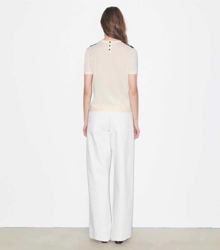 Tory Burch designer sweaters Top en laine avec empiècement en soie in New Ivory / Brown Floral on model back