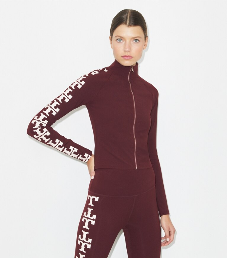 Tory Burch designer tops Top in nylon con zip e logo in Merlot on model detail