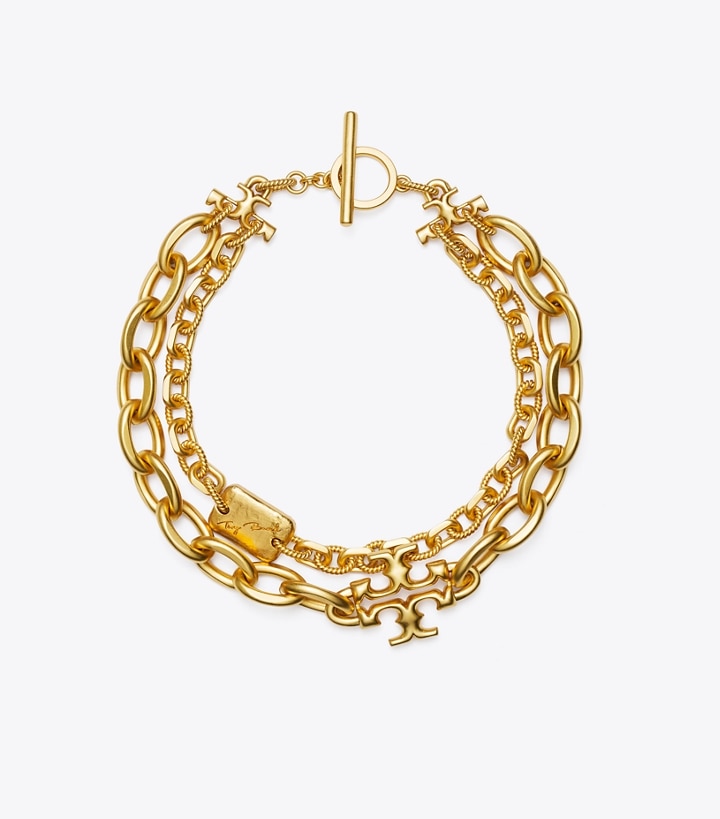 https://s7.toryburch.com/is/image/ToryBurch/style/torsade-statement-necklace.TB_71727_715_SLFRO.pdp-720x819.jpg
