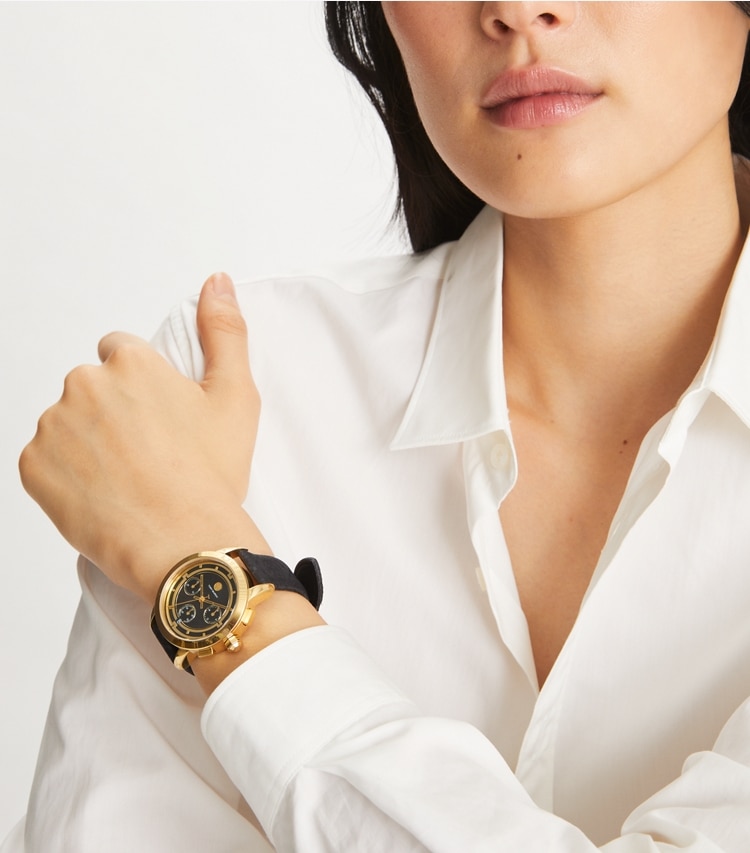 Tory Burch designer strap watches Tory Chronograph Watch, T Monogram Jacquard/ Leather/ Gold-Tone Stainless Steel in BLACK/GOLD/BLACK T MONOGRAM JACQUARD accessory on model