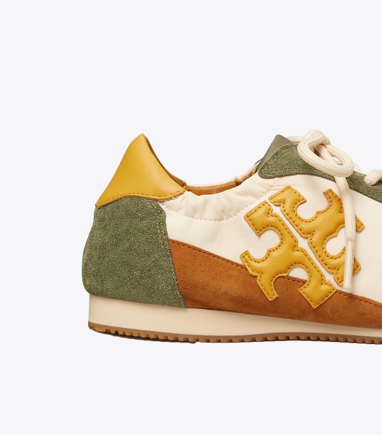 Tory Burch designer sneakers Tory Sneaker in French Cream / Palm Leaf / LIGHT TUMERIC angle