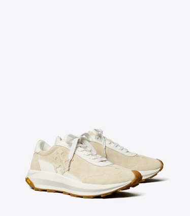 Tory Burch designer sneakers Tory Trainer in LIGHT CREAM / BIANCO / LIGHT CREAM angle