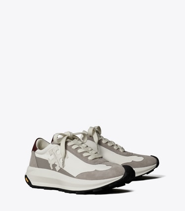 Tory Burch designer sneakers Tory Trainer in CREAM / OSTRICA / BORDEAUX angle