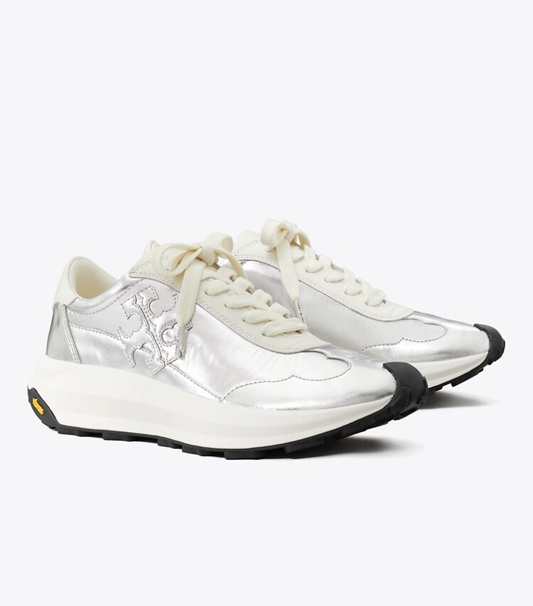 Tory Burch designer sneakers Tory Trainer in METALLIC SILVER/SILVER SPECCHIO/CREAM angle