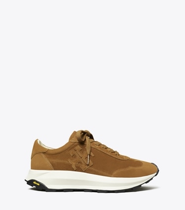 Tory Burch designer sneakers Tory Trainer in Cognac Brown / Cognac Brown / Cognac Brown side