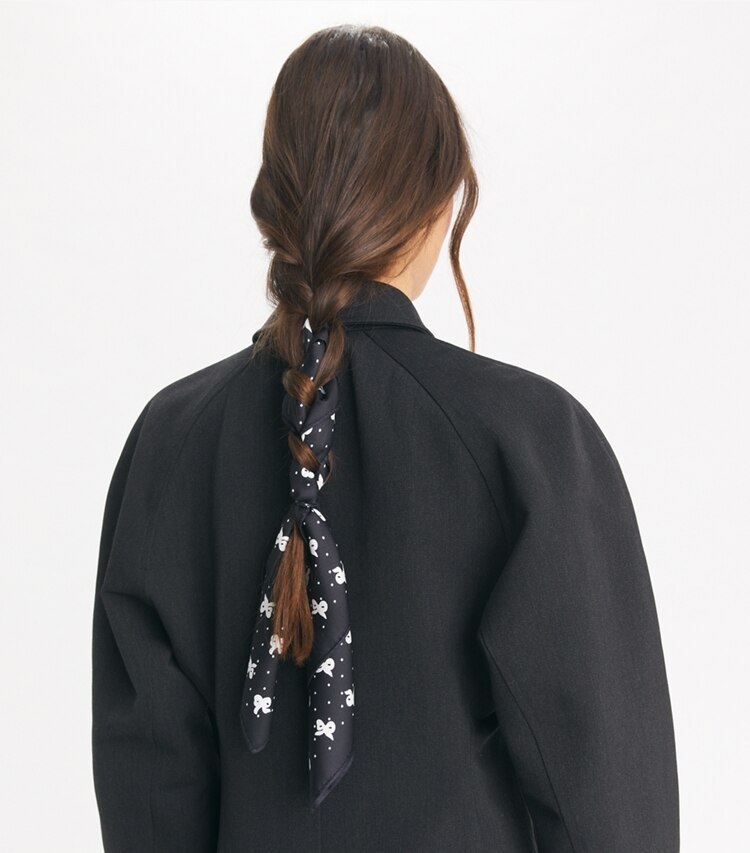 Tory Burch designer scarves Tossed Bows Neckerchief in Black Tossed Bows accessory on model