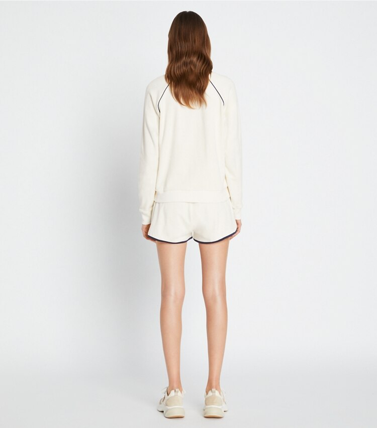 Tory Sport designer bottoms Towel Terry Short in Ivory Pearl on model back