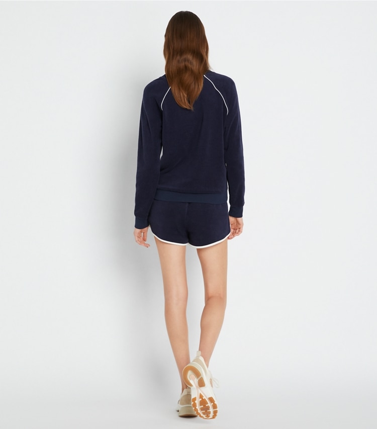 Tory Sport designer bottoms Towel Terry Short in Tory Navy on model back