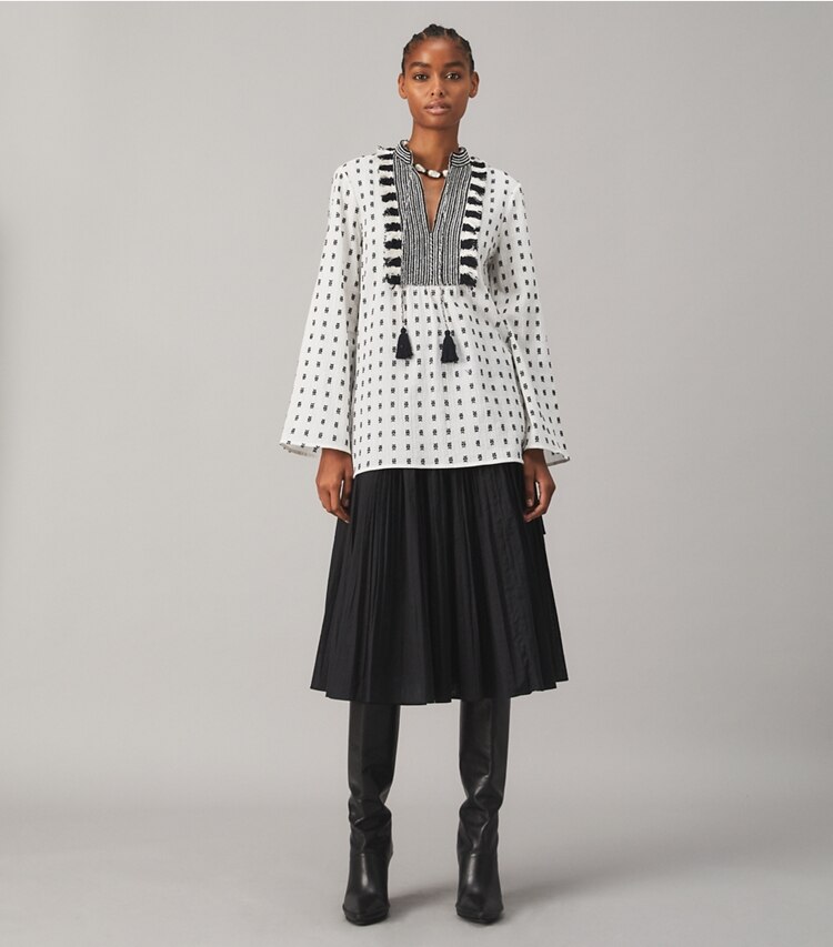 Tory Burch designer tops Tunic with Sweater Tassels in WHITE / NAVY on model front