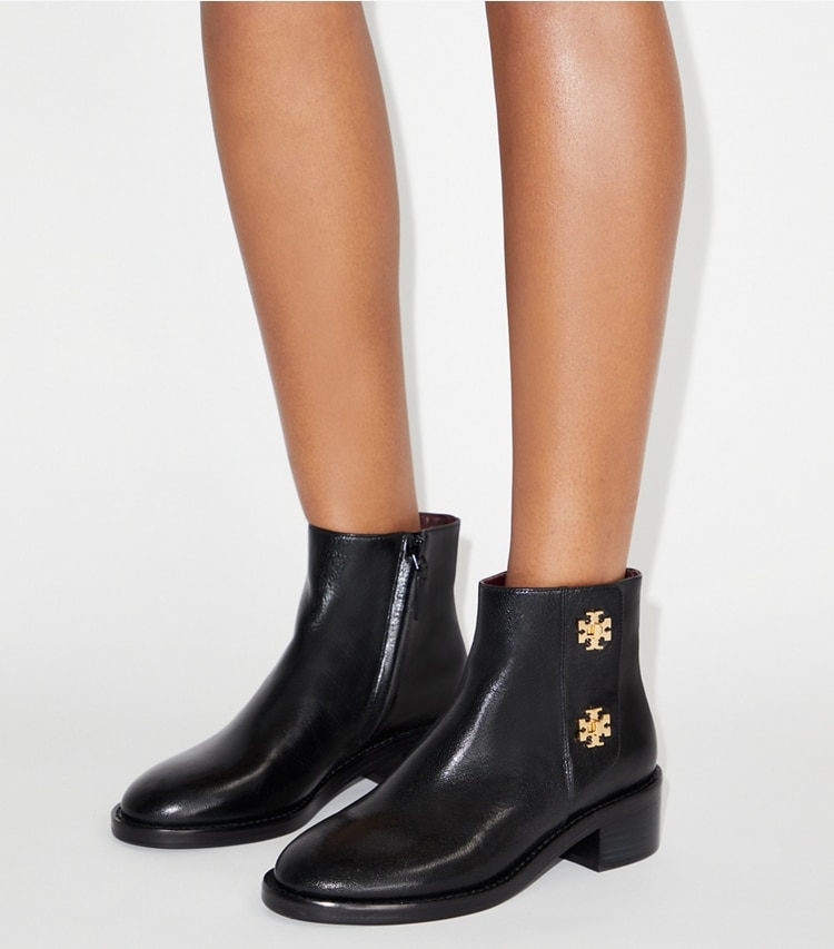 Tory Burch designer ankle boots Turnlock Ankle Boot in PERFECT BLACK accessory on model