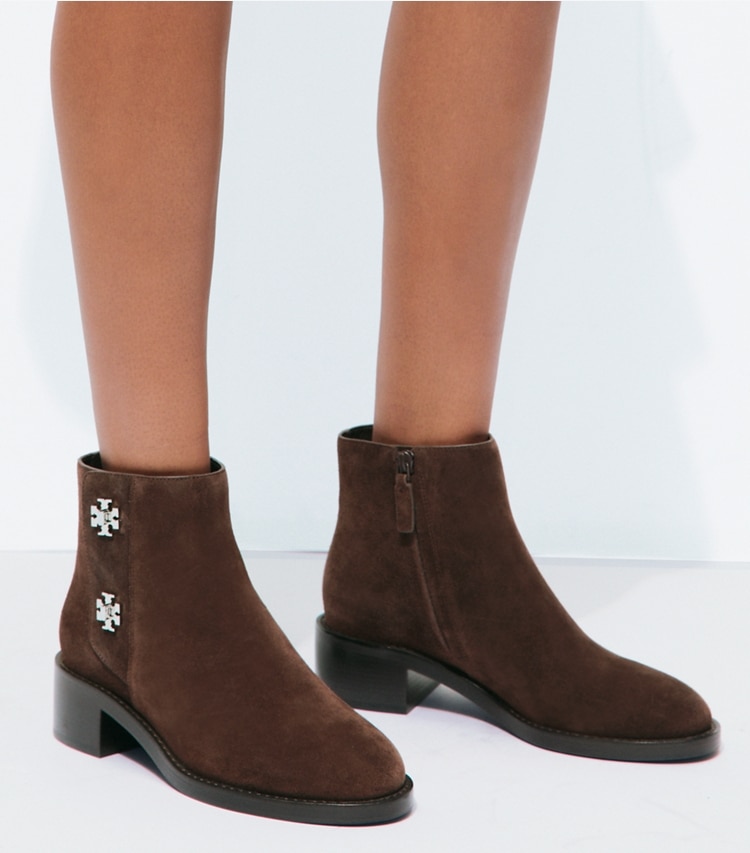 Tory Burch designer ankle boots Turnlock Ankle Boot in DARK COCOA accessory on model