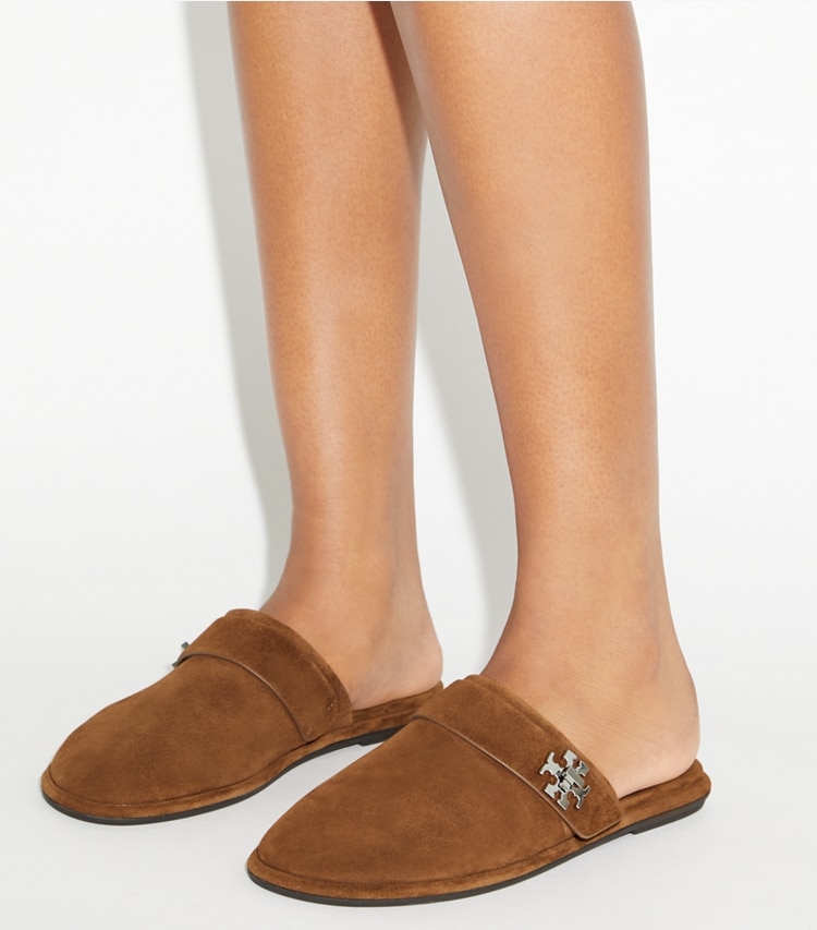 Tory Burch designer flats Turnlock Mule in COGNAC BROWN accessory on model