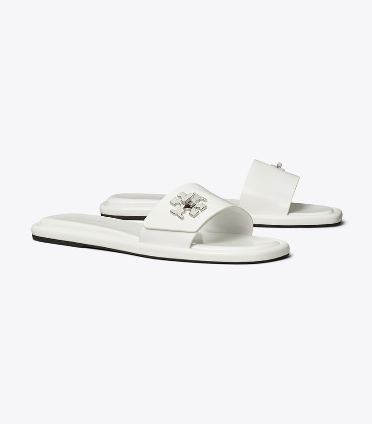 Tory Burch designer sandali Turnlock Slide in CLOUD angle