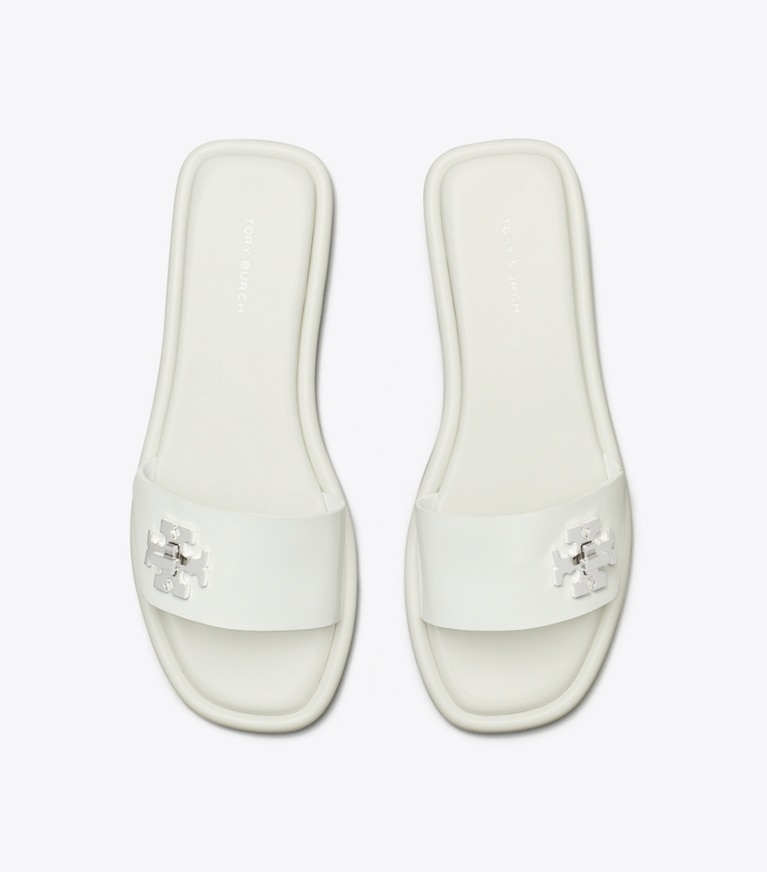 Tory Burch designer sandali Turnlock Slide in CLOUD angle
