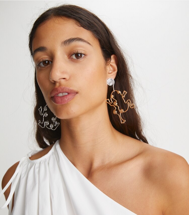Tory Burch designer earrings Twisted Frog Earring in Tory Gold / Shiny Pewter accessory on model