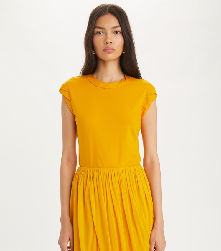 Tory Burch designer tops Twisted Knit Top in Sun on model detail