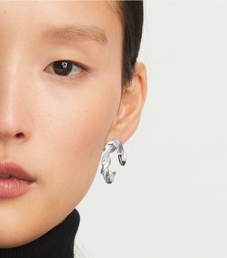 Tory Burch designer earrings Twisted T Loop Earring in Silver accessory on model