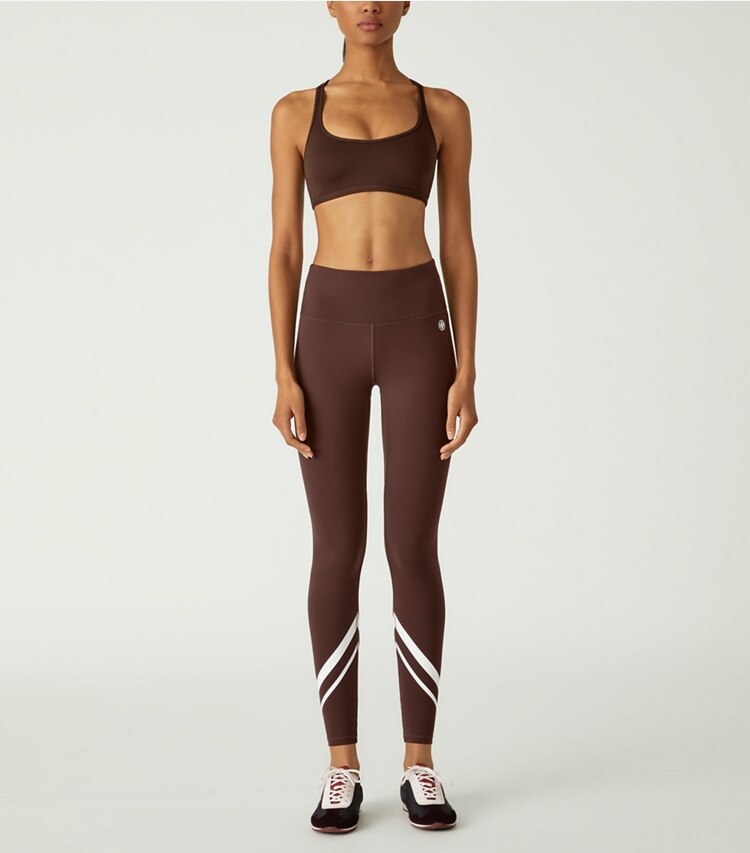 Tory Sport designer sports bras Ultra-Easy Racer Back Bra in Deep Chocolate on model front