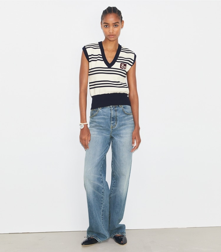 Tory Sport designer sweaters V-Neck Wool Sweater Vest in New Ivory City Stripe on model front