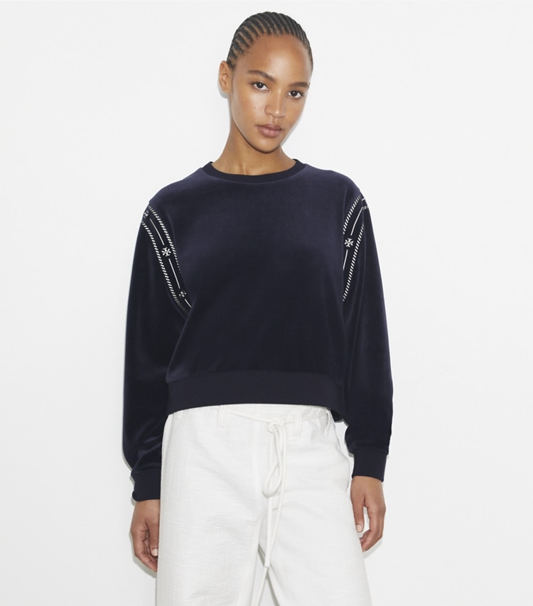 Tory Burch designer sweaters Velour Logo Crewneck in Medium Navy on model detail