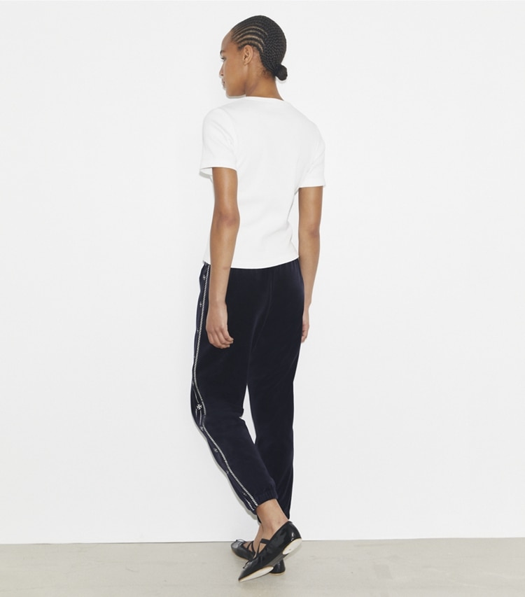 Tory Burch designer bottoms Velour Logo Jogger in Medium Navy on model back