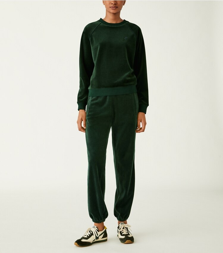 Tory Sport designer sweaters Velour Pullover in Conifer on model front