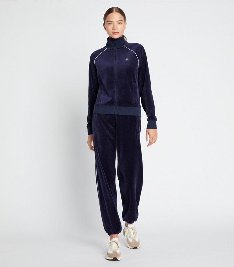 https://s7.toryburch.com/is/image/ToryBurch/style/velour-track-jogger-on-model-front.TB_78448_405_20220922_OMFRO.pdp-767x872.jpg