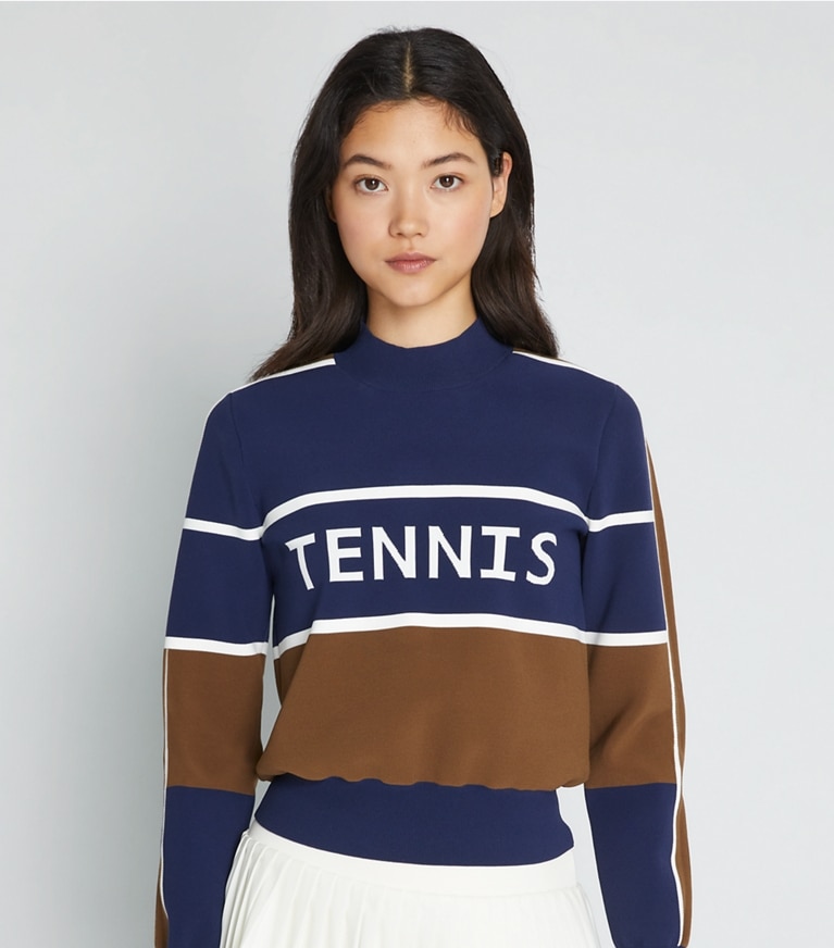 Tory Sport designer strickware Verkürzter Tennispullover aus Funktionsnylon in Tory Navy / Allspice front