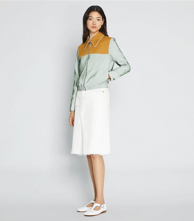 Tory Sport designer vestes Veste en nylon réfléchissant in Electric Sage / Ridge front