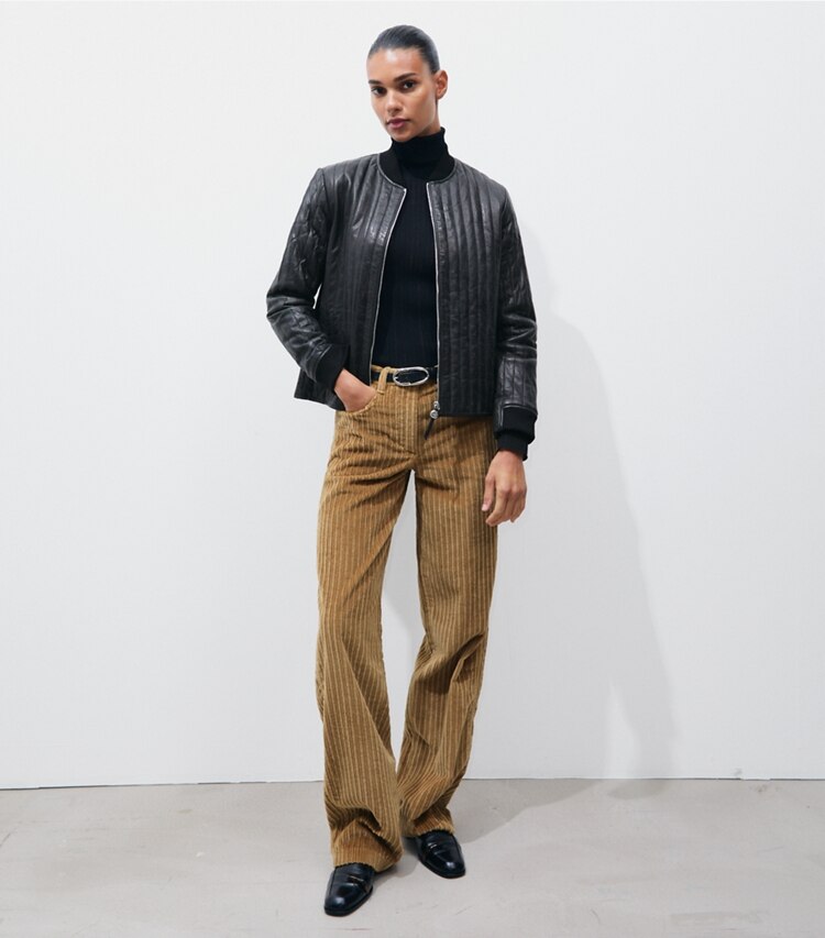 Tory Burch designer vestes Veste matelassée en cuir dans Black sur modèle, de face