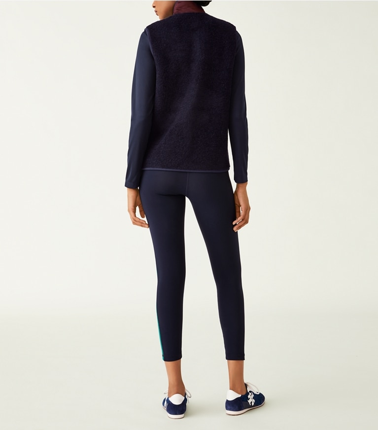 Tory Sport designer manteaux Veste sans manches zippée en polaire in Tory Navy / OXBLOOD front