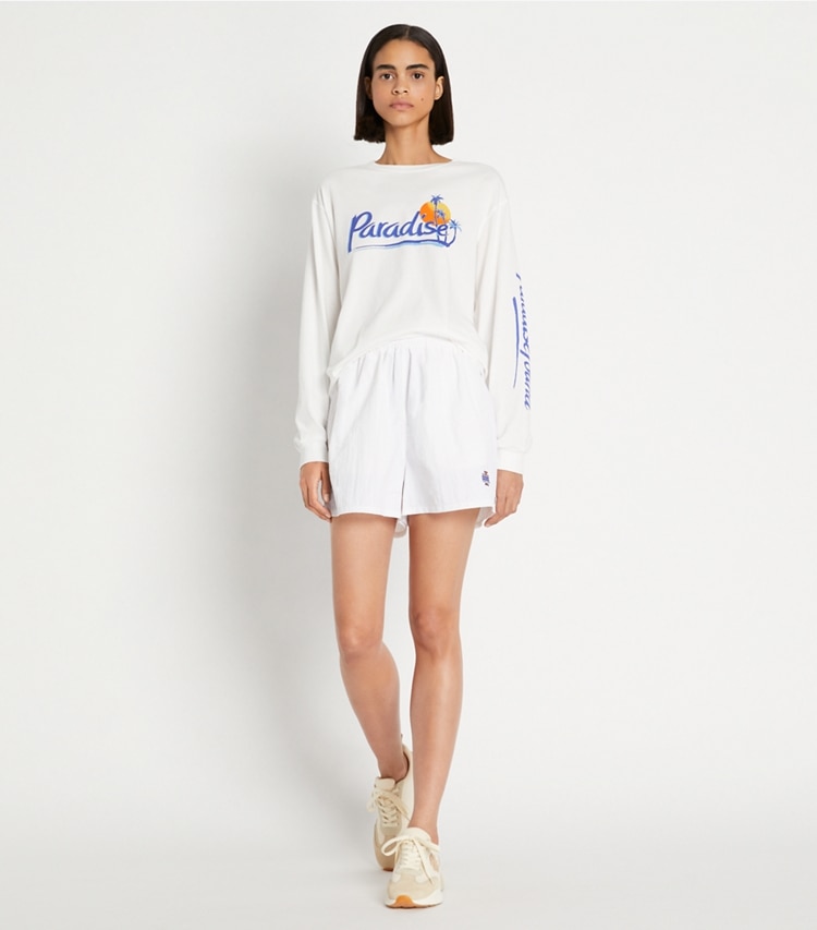 Tory Sport designer tops Vintage Graphic Long-Sleeve Tee in Snow White on model front