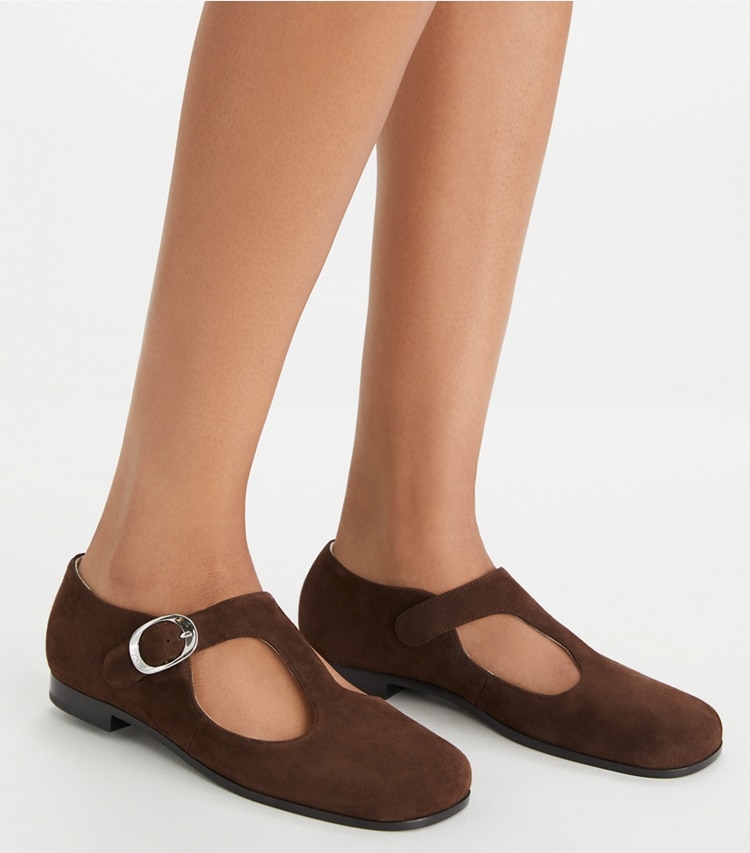 Tory Burch designer flats Violet T-Strap in DARK COCOA accessory on model