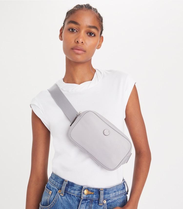 Tory Burch designer belt bags Virginia Belt Bag in Bay Gray accessory on model