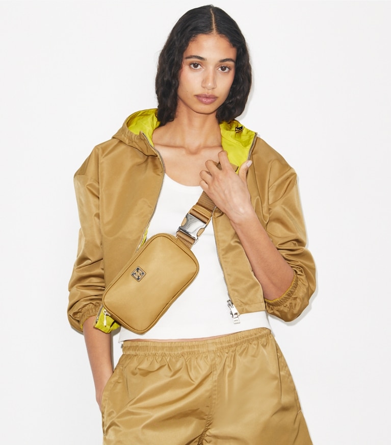 Tory Burch designer belt bags Virginia Belt Bag in Wheat accessory on model