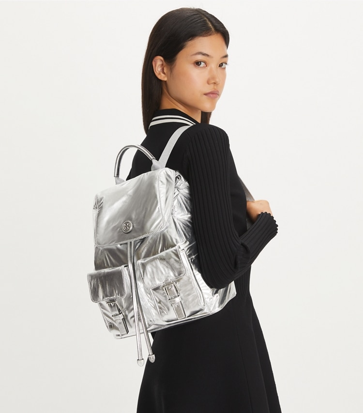 Tory Burch designer backpacks Virginia Metallic Flap Backpack in Silver accessory on model