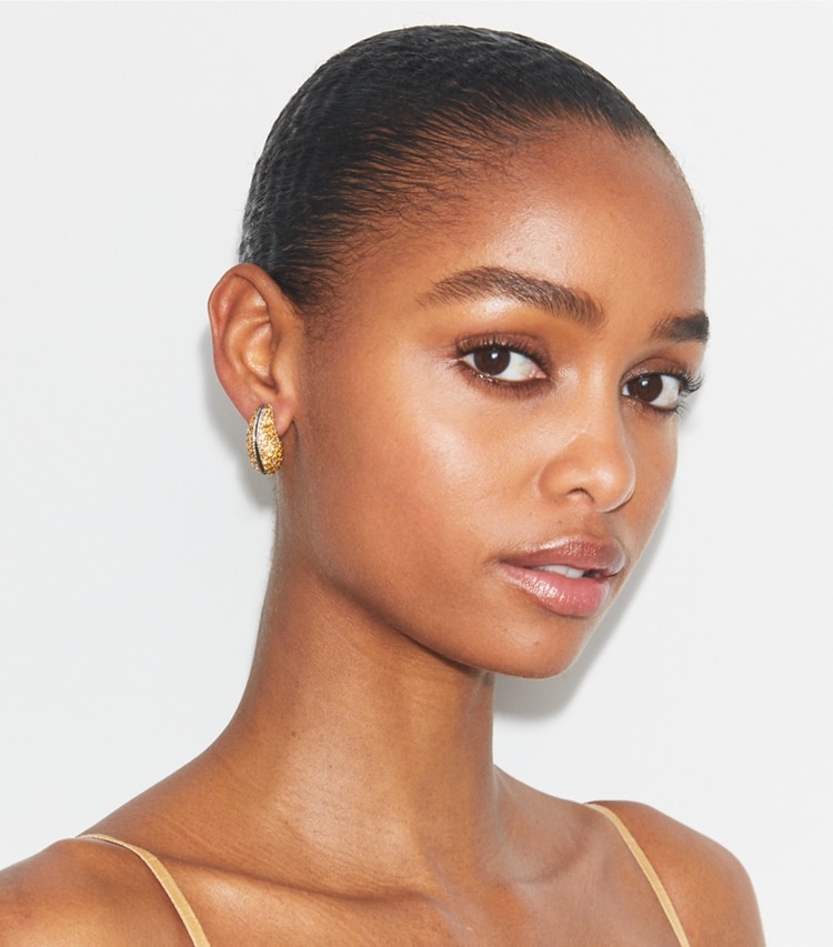 Tory Burch designer earrings Wave Earring in Light Topaz accessory on model