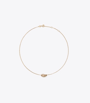 Tory Burch designer necklaces Wave Pavé Pendant in Light Brass / Crystal front
