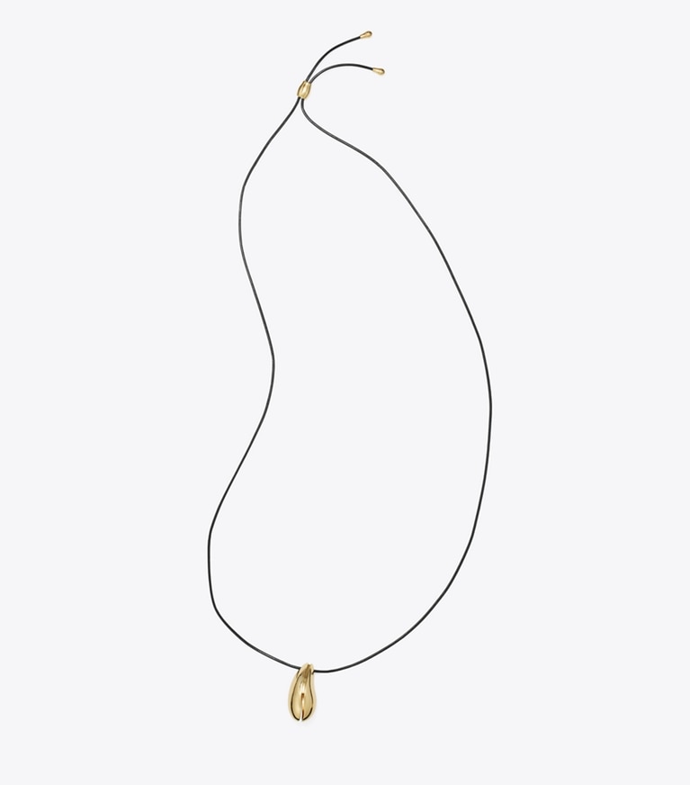 Tory Burch designer necklaces Wave Pendant in Light Brass / Black front