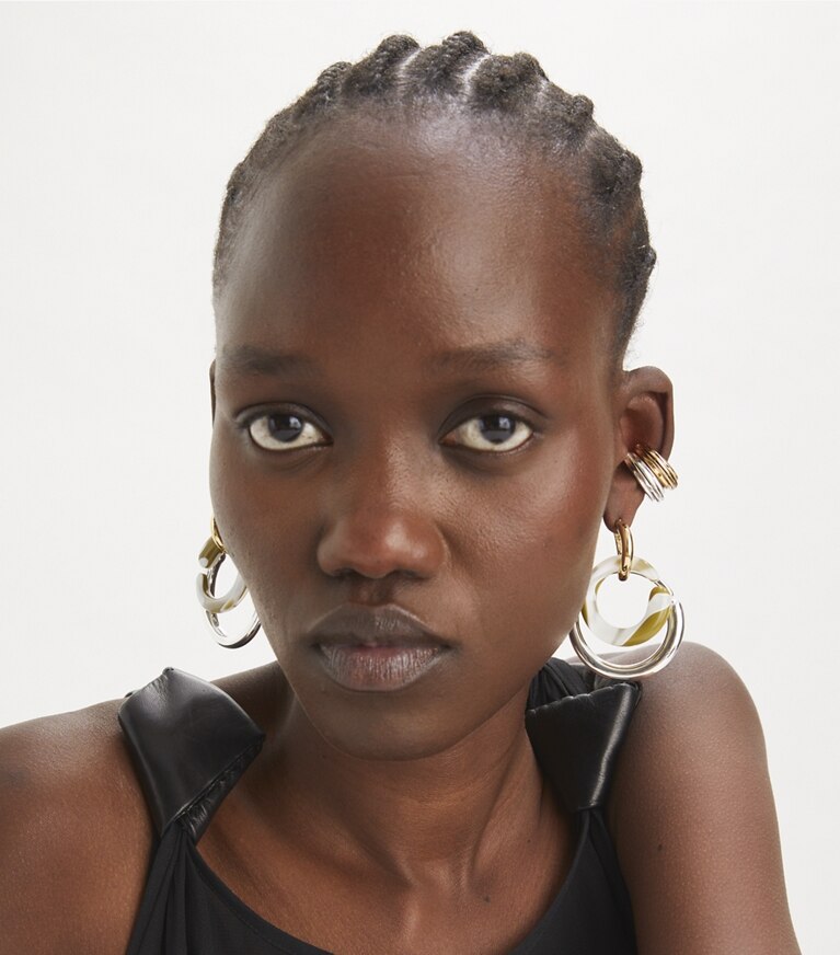 Tory Burch designer ohrringe Wave Statement-Ohrring in Light Silver / Light Brass / Green Swirl front