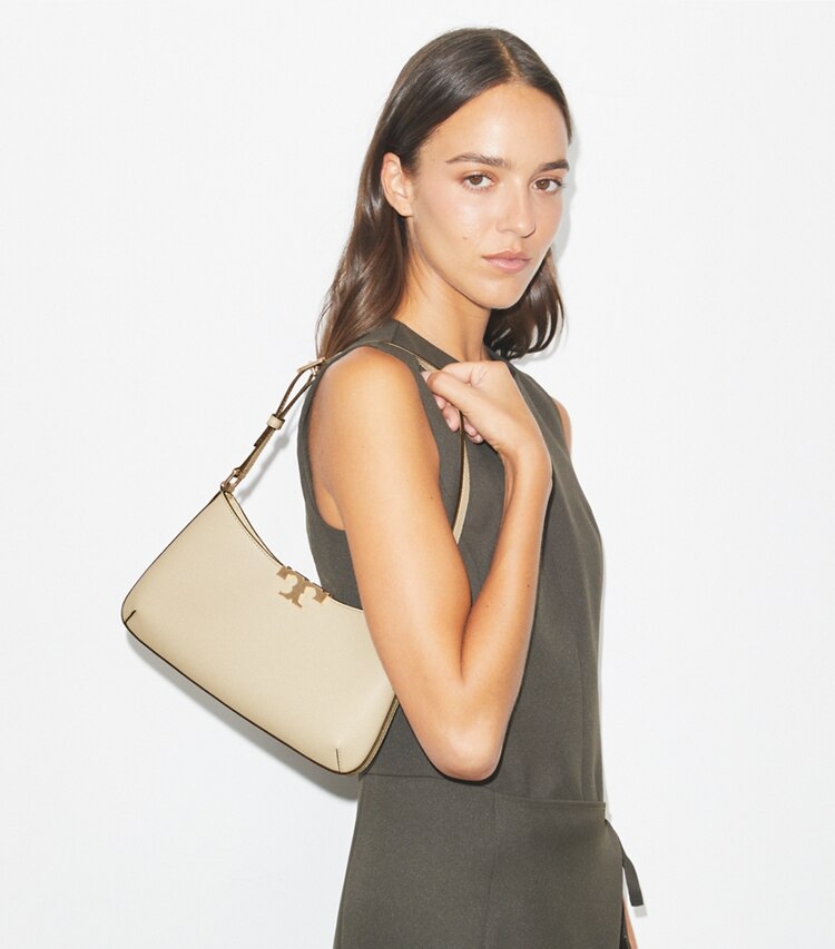 Tory Burch designer schultertaschen Weiche, schmale Eleanor Schultertasche in Light Stone accessory on model