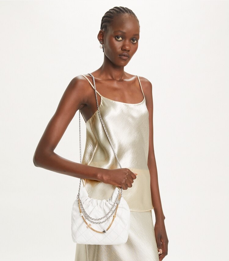 Tory Burch designer crossbody bags Weiche Fleming Mini Bag in Used-Optik mit Tunnelzug in Blanc accessory on model