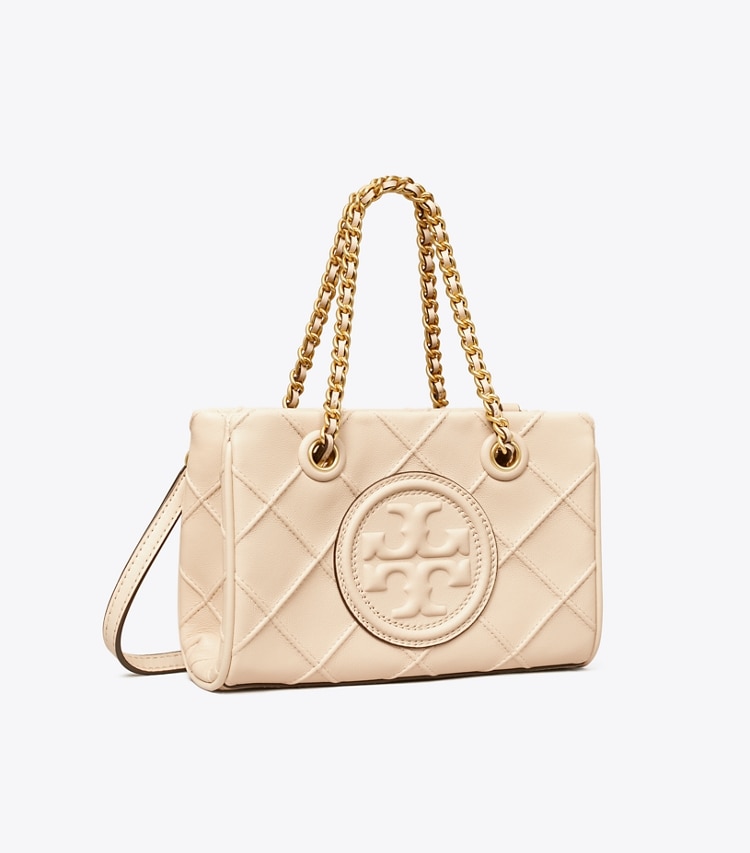 Tory Burch designer crossbody bags Weiche Fleming Mini Tote Bag mit Kettenriemen in New Cream angle