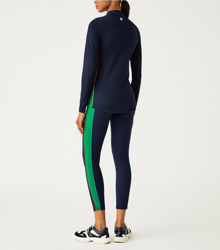 Tory Sport designer tops Weightless Contrast-Piped Half-Zip Pullover in Tory Navy / Vineyard on model back