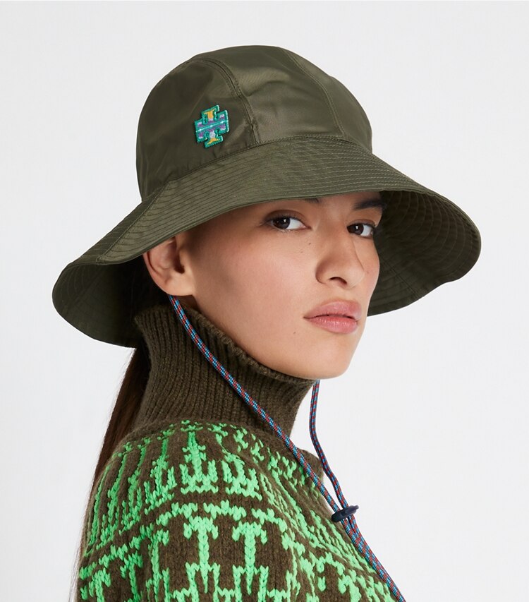 Tory Sport designer hats Wide-Brim Bucket Hat in Sand Khaki accessory on model
