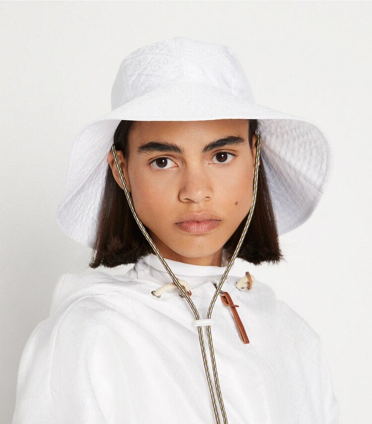 Tory Sport designer hats Wide-Brim Woven Jacquard Bucket Hat in Optic White accessory on model