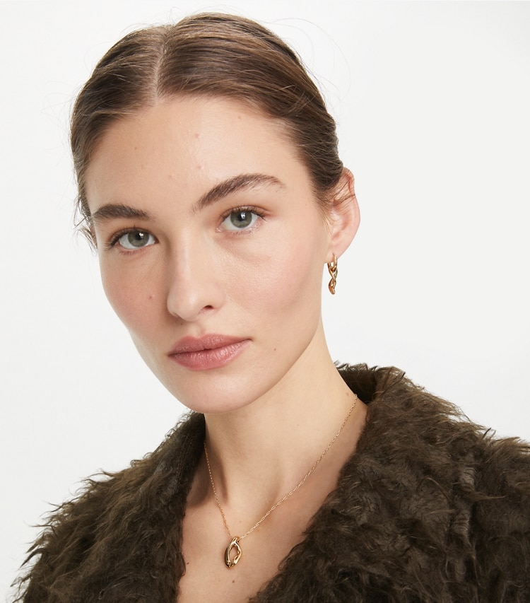 Tory Burch designer necklaces Wishbone Pendant in Tory Gold accessory on model