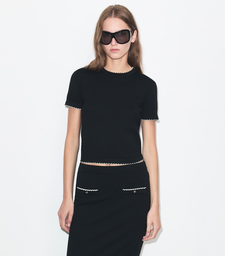 Tory Burch designer strickware Wolltop mit Wellenkante in Black / New Ivory on model detail