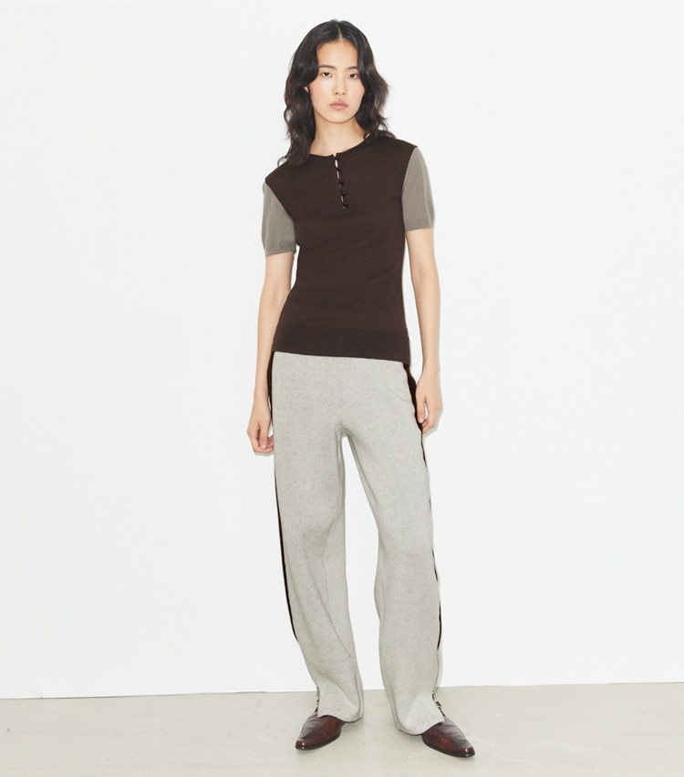 Tory Burch designer sweaters Wool Henley in Light Gray / Dark Brown on model front